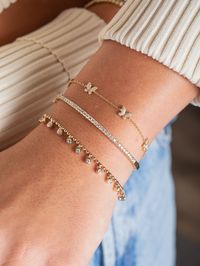 LeMel is known for its dainty gold jewelry! This dainty diamond butterfly bracelet is the perfect addition to any bracelet stack! Layer it with a paperclip chain bracelet or make a statement with some tennis jewelry!