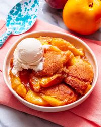 My classic Southern style vegan peach cobbler is packed with juicy roasted peaches, topped with crisp, buttery biscuits. Perfect with a scoop of vegan ice cream!