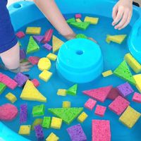 Water Table Wednesday | I was inspired by @earlylearning101 Shape challenge this week to make a sponge sensory water play invitation out on the porch in our handy dandy water table. All three of my boys were immediately drawn in and played for ages. They were experimenting with the sponges seeing what makes them sink or float, squeezing out the water and working on grip strength, sorting colors, identifying shapes, making sponge prints on the driveway and much more! I'll be sharing some favo...