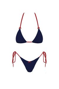 As an expert in the fashion industry, this Navy Red Julia Bikini Set is the perfect choice for your 4th of July celebrations. Made with quality materials, it offers both style and comfort, making it the ideal outfit for enjoying the summer sun. Don't miss out on this versatile and patriotic set! PRE-ORDER 06/30/24