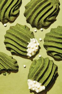 A generous amount of matcha powder adds gorgeous colour to these butter cookies, which are finished with a quick dip into some melted white chocolate.