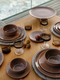 Kelly Wearstler X Serax - Party Decoration Ideas: This outdoor dinner party table features products from the Zuma Collection in collaboration with Serax. Included in the table decor is Zuma Glassware, Zuma Plates, the Zuma Serving Dish, the Zuma Bowl, and the Dune Bowl High. Tap the pin to shop the dishes sets by Kelly Wearstler and for more outdoor ideas, outdoor living space, dinner ideas, and dining table decor. #DinnerPartyThemes #Entertaining #OutdoorDiningSpaces