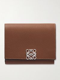 Loewe's wallet has a neat trifold shape, to offer maximal storage without taking too much space in your bag. It's been made by the label's Spanish artisans from textured-leather and features the signature 'Anagram' plaque. Use yours to store bills, credit cards and receipts.