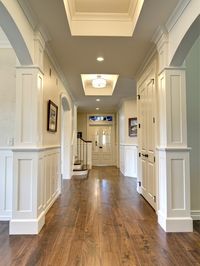 Walnut hardwood floors against white walls and doors - beautiful