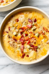 This cheeseburger soup recipe has all your favorite burger flavors in one comforting, warming, and flavorful soup! It's cheesy, easy, and totally delicious.