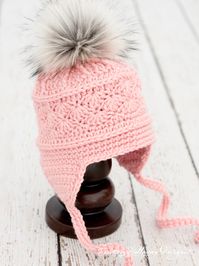 This sweet ski hat crochet pattern is simple, yet stylish and makes a great hat for those crocheters who are comfortable with beginner patterns, and want to try their hand at something a little more complex (but still "easy"). Six sizes are included so you can make this crochet hat for each person in your family!