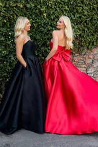 Expertly crafted from high-quality satin, this Sweetheart Strapless A-Line Prom Dress exudes elegance and sophistication. Designed to highlight your natural curves and flatter your figure, this dress features a sweetheart neckline and a flowy A-line silhouette. Perfect for any special occasion, make a statement and turn heads with this stunning prom dress.