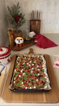 Kyree’s Dream Home on Instagram: "Christmas bark / crack. Kinda like a rocky road but thinner 😂 freezing this for Christmas Day snacks with tea & coffee 🍫☕️ In a pre heated oven 180°C fan forced 3 minutes only. It won’t look melted, you’ll need to carefully poke it with a fork to see and the chocolate will be melted. Don’t be fooled and over cook it."