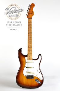 First year 1954 Fender Stratocaster with Western Australian provenance. One piece Ash Body, Bakelite plastic parts, Maple Neck featuring Skunk Walnut Stripe, hand-smoothed Headstock, Tremolo Bar. Neck and Body both date to mid-1954. Newer Butterfly String Tree installed, later plastic Pickup Covers, Five-way Switch is installed with the original Three-way Switch sitting inside the brown tolex Fender case.