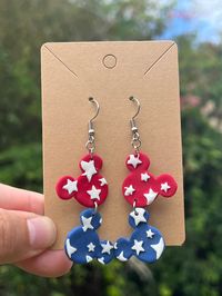 "USA Star Mouse Clay Earrings | Fourth of July | Summer Earrings | Polymer Clay Earrings | Summer Earrings Handmade with polymer clay. Earring posts are made of gold colored stainless steel.  Approx. Dimensions: 2.5\" x 1.5\" *Due to the handmade nature of this product there may be slight impurities, variations in color and pattern placement. **Please see processing/shipping time estimates before ordering. If needed by a certain date please message me directly before ordering and I'll do the best I can to make magic happen!  Please be sure to double check shipping information is correct before ordering. I am not responsible for reshipping items that are returned to me due to an undeliverable shipping address. As always, My Caffeinated Chaos products are proudly made in"