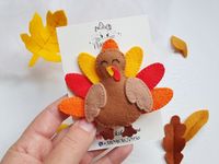 An Autumn felt Turkey headband or hair clip for Thanksgiving Day.  Ideal for Fall photo shoot, festival goers, themed parties or to liven up any Autumn outfit. Size detalizations: Headband arrangement 3.7 inches/9.5 cm width and 3.1 inches/8 cm high It may vary slightly in size due to the handmade quality. Suitable for children and adults. The nylon headband is very stretchy and will not mark your childs head. The headband is perfect for professional newborn baby photos. I am design, cut and ass