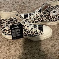 Women’s Converse High Top Sneakers. Cheetah Print On One Side, Black Sparkly On The Other Side. Never Worn. Tag Still Attached