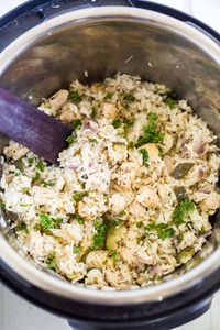 This instant pot Greek chicken is covered in olive oil and herb marinade and cooked in 10 minutes with the rice for a one pot meal. This recipe is an easy dinner and great for meal prep Greek chicken bowls. It's gluten free and dairy free too!