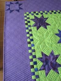 Love the quilting in the alternate blocks.