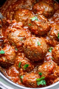 Slow Cooker Italian Sausage Meatballs - A dreamy and hearty, comfort-style slow cooker recipe that's too good NOT to be on rotation!