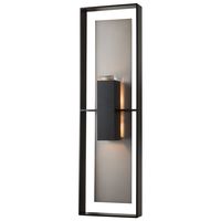 The Shadow Box Tall Outdoor Wall Sconce brings faultless geometric balance to a variety of exterior spaces. Layers of diffused light and dramatic shadow create the perfect blend of style and austere lines. A block of optic crystal, for an added touch of elegance.<BR><BR>Robust Coastal Outdoor finishes are specifically formulated to resist some of the harshest environmental conditions. Lifetime Limited Warranty when installed in residential setting. Handcrafted to order by skilled artisans in Ver