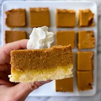 Pumpkin Pie in a bar! A short-bread like cookie base   the YUMMIEST pumpkin filling makes for a delicious gluten-free treat! Dairy-free optional and super EASY to make.