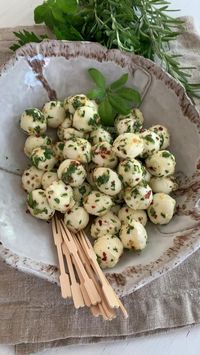 Everyone loves cheese appetizers, and there is nothing easier than Marinated Mozzarella Balls! You can toss these together quickly with a simple marinade, fresh herbs, and seasonings, to go on a gorgeous charcuterie board or antipasto platter for a large crowd. Add some crackers, crusty bread, and drinks to get the party going...