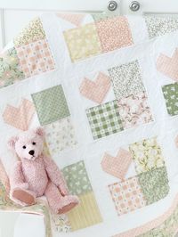 Are you looking for a quilt pattern that radiates warmth, charm, and a touch of garden magic? Look no further! Introducing the Love Grows Here Quilt Pattern PDF! This delightful design features hearts growing in rows of a garden patch, symbolizing love and growth in every stitch. Perfect for a baby quilt, throw quilt, twin size quilt or queen size quilt - 4 sizes included and it's Charm Pack Friendly! The Love Grows Here Quilt Pattern is perfect for quilters of all skill levels. The pattern is d