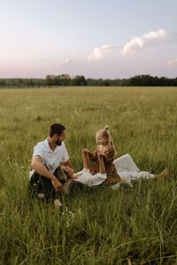 Family Photo Inspiration for boho vibes. Boho aesthetic family photos. Pose ideas for a family of three.