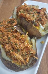 Crockpot BBQ Pulled Chicken Stuffed Baked Potatoes