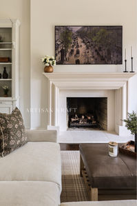 Modern Bolection Fireplace Surround by Artisan Kraft. Shop our link below for more cast stone fireplace mantel surrounds. Photo and design by Park&Oak.