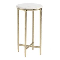 Our Vala mid-century accent table contrasts a round white-marble top with the X-crossed stretchers joining its golden cast-aluminum legs. Crafted with artisan attention to detail, its polished marble surface is finished with a full bullnosed edge and the lightweight base of legs is stylish in gleaming gold. A substantial feat of fine craftsmanship, this glamorous side table is an affordable luxury with a timeless two-tone design.