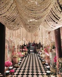 A Floral Welcome: Beautiful blooms adorn the entrance to this stunning space!!#floraldecor #entrancedecor#floraldesign#flowerarrangement #entranceflowers#floralentryway #floralentrancedecor#entrancebeautification #bookeventz #bookeventzweddings