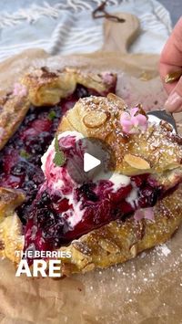 Vesela Asenova| Recipe Creator on Instagram: "This is the easiest most delicious Berry Galette you can make in 15 mins and devour it in even less than that 😋😅 The berries are so juicy, sweet, tart and they melt into a perfect jammy consistency! The buttery puff pasty complements the berries so well and adding a scoop vanilla ice-cream is always a good idea! 
Ingredients: 
1 sheet puff pastry @dufourpuffpastryk thawed according to package instructions; 
1 lb berries of choice (I used strawberries, blueberries and raspberries) 
1/3 cup sugar
2 tsp cornstarch 
1 tsp vanilla bean paste/extract 
1/4 cup chopped/slivered raw almonds 
Course sugar for sprinkling 
Powder sugar for dusting 
Mint leaves 
Vanilla ice- cream for serving, optional but highly recommended 

Egg wash: 
1 egg + 1 tsp wat