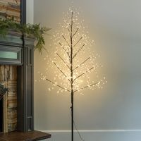 Fairy light trees add sophisticated style to home and holiday decor schemes in a unique way!