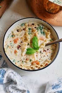 I've been seeing Lasagna Soup EVERYWHERE and knew I wanted to try a creamy, luxurious version with chicken (and some tasty veggies) for my Soups that don't Suck series.

Perfect for chilly evenings, this soup blends the comfort of traditional lasagna with the ease and simplicity of a one-pot meal. I truly can't get over the