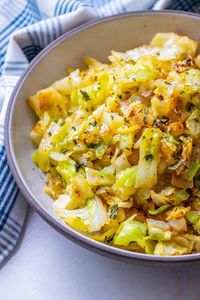 Caramelized Cabbage and Onions - Sweet C's Designs - Delicious, buttery caramelized cabbage and onions are a salty, simple, and totally crave-worthy side dish! #sautedcabbageandonions #sidedishes