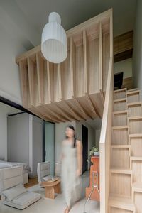 A Tiny Apartment in Singapore Maximizes Space With a New Loft