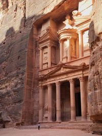 Size: 24x18in Tourist Looking Up at the Facade of the Treasury (Al Khazneh) Carved into the Red Rock at Petra, UNWe have more Martin Child Posters. Choose from our catalog of over 500,000 posters!