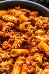 close up of lentil bolognese over pasta.