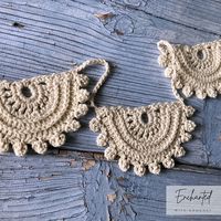 This listing is a crochet pattern only. The crochet pattern contains charts, notes and pictures.  The pattern is made as a PDF file. I use US terms and the language of the pattern is English. * * * * * * * * * * * * * * * * * *  The Moon Garland Crochet Pattern embodies the essence of bohemian wall decor. With its stunning textured crochet pattern resembling bubbles and a half-moon shape, this garland is a captivating addition to any room. The name Moon Garland perfectly captures its celestial-i