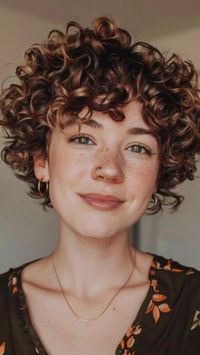 35 Short curly haircuts hairstyles   Looking for a fresh look? Explore our collection of stunning short curly haircuts that highlight texture and volume. Perfect for every face shape, these styles are low-maintenance yet trendy, making them ideal for busy lifestyles. From bouncy curls to edgy pixie cuts, find inspiration that suits your personality.    #ShortCurlyHair #CurlyHair #HairInspiration #CurlyHairstyles #TexturedHair #PixieCut #HairGoals #NewLook #HairTrends