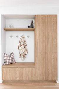 Adjacent to the kitchen, a mudroom nook has been seamlessly integrated.