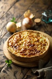 Mary Berry’s Cheese and Onion Pie is a comforting dish made with butter, onions, potatoes, milk, flour, mustard, thyme, cheddar cheese, and parmesan. This recipe takes 2 hours to make and serves 6 people.