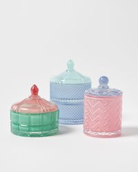 Tall storage pot inspired by art-deco opulence and cut crystal. Playful colour blocking in the glass creates a contrasting base and lid.