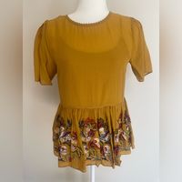 Beautiful Intricately Beaded Peplum Blouse By Bhunani Sold At Anthropologie. Rich Mustard Color. Comes With Matching Undershirt. New With Tags. Size Xs But Dress Form Has 34 Inch Bust And 27 Inch Waist.