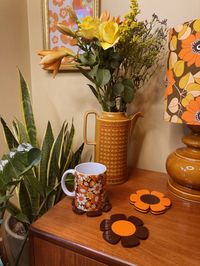 Groove up your living space with our Marigold coaster set. These make the perfect space to rest your drink, and the perfect gift for your retro loving friends!