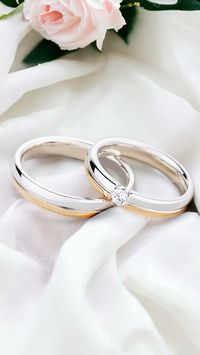 Beautiful and very comfortable pair of wedding bands. Classic shape and rounded inner edges make these rings almost insensible on your fingers.  The price is for a pair of rings.