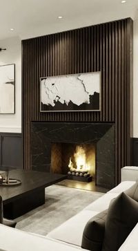 a refined contemporary living room with a fireplace with a black marble surround and a fluted one, dark and white furniture