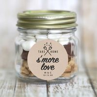 Cute "Take Home s'more love" design with roasting marshmallows art at the top. Kraft background is an image only not actual Kraft paper. The font for the couple's initials and date are customizable. Great for s'mores gifts!