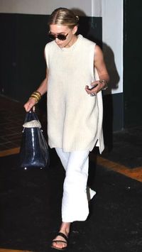 white monochrome outfits  • mary kate olsen style  • ashley olsen style   • the row  • sweater vest  • knit pants   • black puffy sandals   • white denim overall outfit  • summer outfit idea  • casual chic outfit inspo  • birkenstock boston outfit