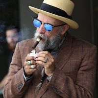 You may be cool. But you'll never be  cigar-chomping, gray pigtailed beard, panama hat wearing dude in blue shades cool.