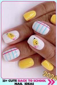 Short, round nails with playful lined paper and pencil designs. Yellow glitter accents. Gel polish with a glossy finish. Fun and cheerful for back to school nails.