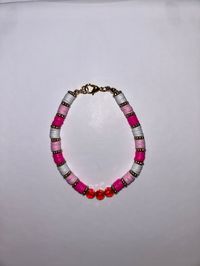 2 shades of pink and white beads with gold and shiny pink beads