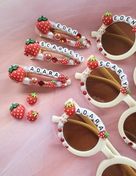 🍓 Juicy Strawberry Who else have kid/s who loves strawberries? 🙋‍♀️ Go on mama, spoil them with these These adorable Sunnies comes with Strawberry Charms, pearls, and red crystals.Round sunnies will best fit little ones age upto 7 YOMax 7 Letters only What you need to know WARNING! CHOKING HAZARD! Contains small parts. Please do not leave children under the age of 3 without parental supervision while wearing. Please note that pearl and rhinestone colors are matched to the sunnies, unless a req